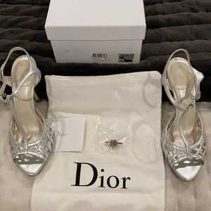 Dior silver heels.